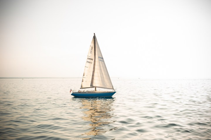 a small boat in a body of water